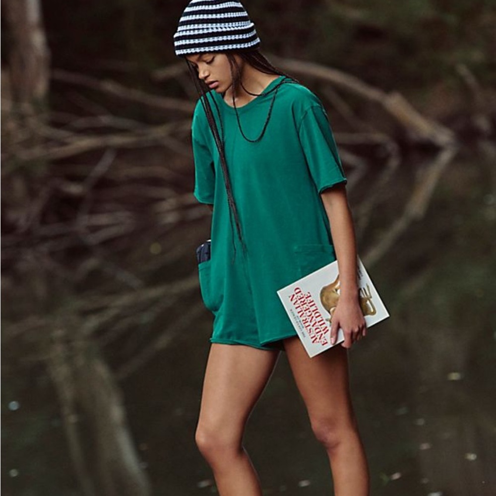 New With Tags. Free People Movement Hot Shot Tee Romper in green.